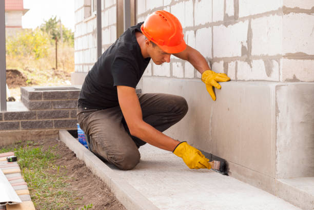 Waterproofing professionals working in New Era, MI